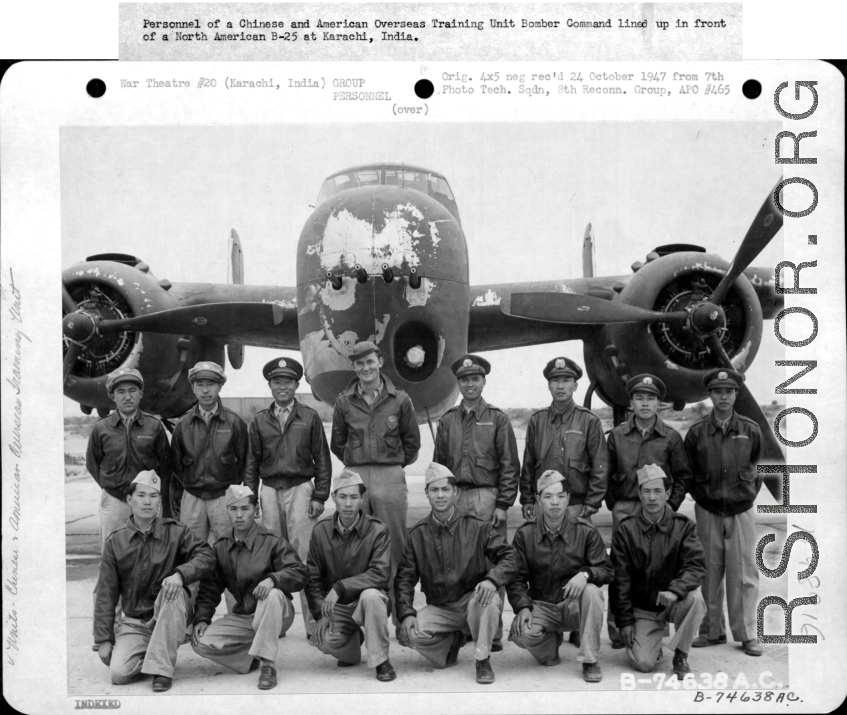 Personnel of a Chinese and American Overseas Training Unit Bomber Command lined up in front of a North American B-25 Mitchell at Karachi, India.  Image courtesy of Tony Strotman.