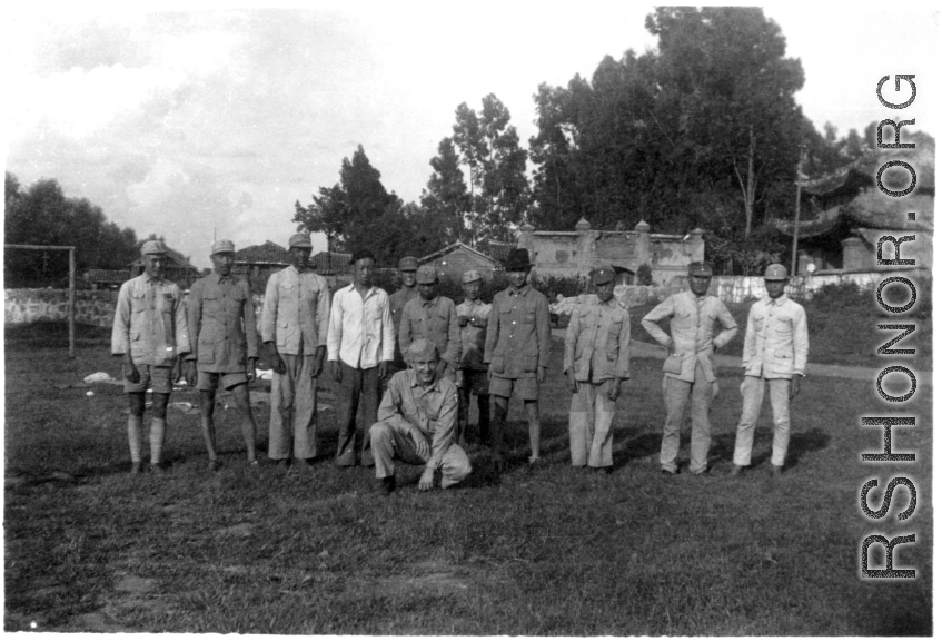 GI poses with Nationalist soldiers in SW China during WWII.