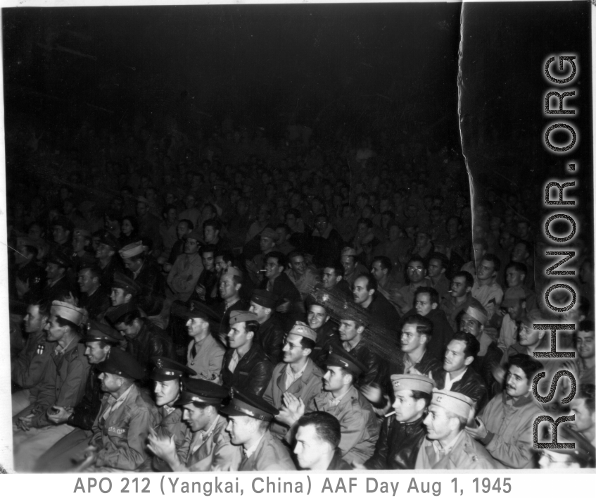 GIs applaud while watching performance, during AAF Day celebrations, August 1, 1945, at Yangkai, APO 212, during WWII.