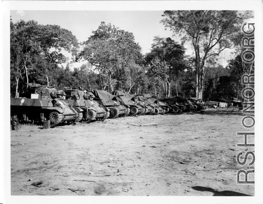 Tanks parked along Burma Road.  797th Engineer Forestry Company in Burma.  During WWII.