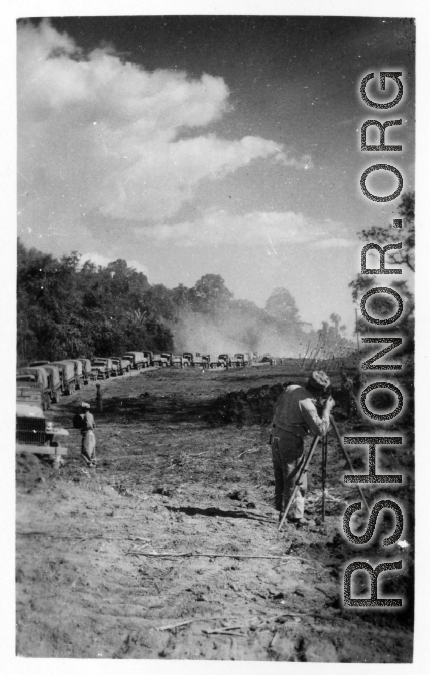 797th Engineer Forestry Company in Burma: Slow moving convoy through construction on the Burma Road.  During WWII.