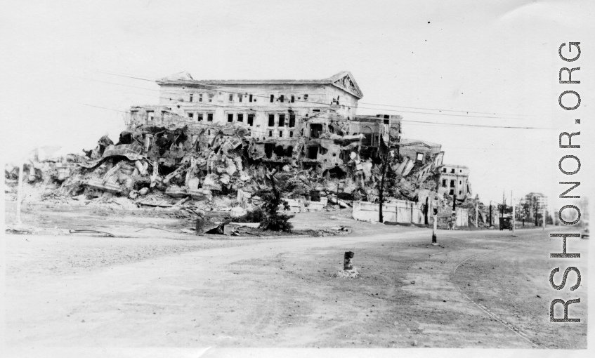 A bomb-damaged government building in Manila after the Japanese occupation of the Philippines. It is unknown how this got into Schuharts collection as a member 2005th Ordnance Maintenance Company, as he should have returned to the US via the Atlantic, and thus with no stopover in the Philippines.