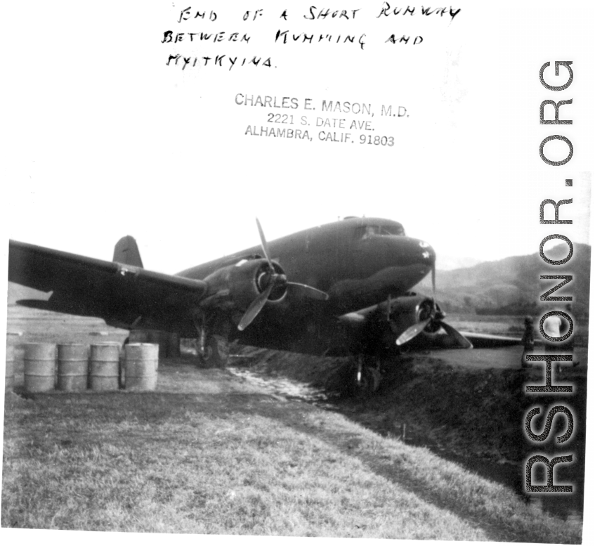A C-47 in a ditch at the end of a short runway somewhere between Kunming and Myitkyina, during WWII.