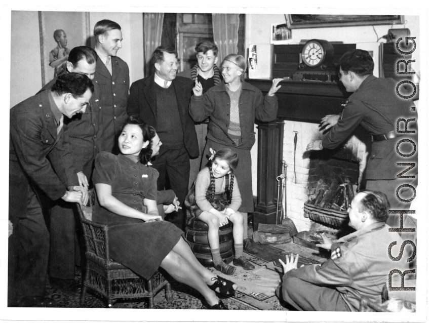 Alice Chong pressed into public relations duty at Kunming during the winter of 1943-44.  When a visiting troupe of USO entertainers, Hollywood actors, visited the 14th U.S. Army Air Force base,  Alice was detailed to lead them around, answer their questions, translate for them, and in general make  them feel at home.  Of the four Hollywood actors at center, Edmund O’Brien (1915-1985) at  left and Mickey Rooney (1920-2014) at rear are the most probable identifications, but the “grandma”  and “little girl” ac