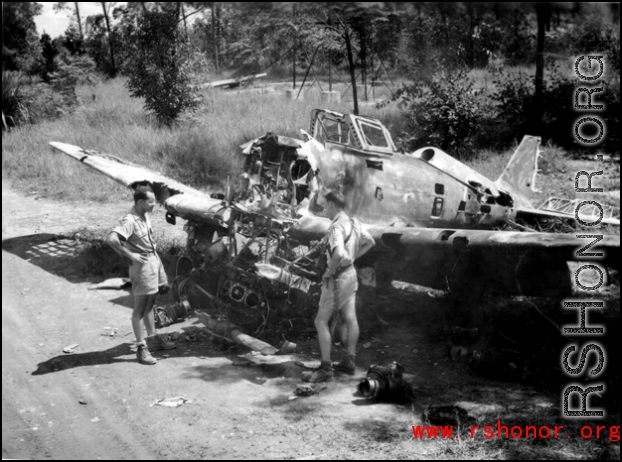 A destroyed Japanese fighter left over at the airbase after the Japanese retreat from Liuzhou. Photos taken by Robert F. Riese in or around Liuzhou city, Guangxi province, China, in 1945.