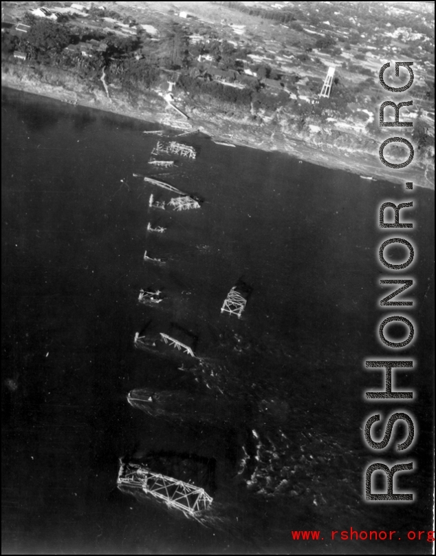 Aerial view of Liuzhou, Guangxi, China, during WWII--destroyed railway bridge.  Photos taken by Robert F. Riese in or around Liuzhou city, Guangxi province, China, in 1945.