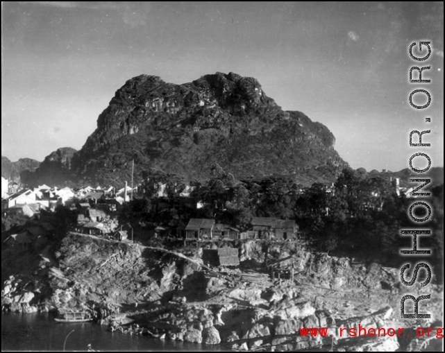 During the last hours of the day, looking towards Horse-saddle Mountain (马鞍山) in Liuzhou city, Guangxi province, during WWII.