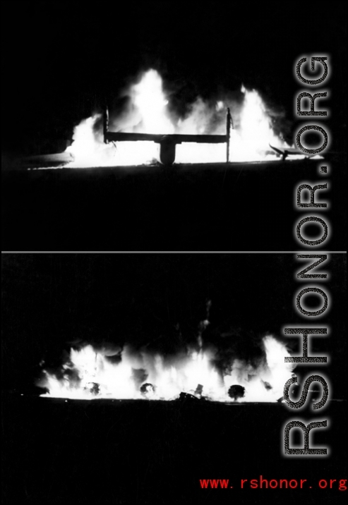 A B-24 bomber burns in the night at Guilin during WWII.