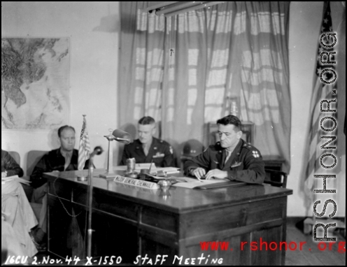 Chennault holds staff meeting on November 2, 1944, in China, during WWII.