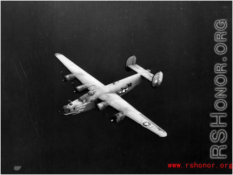The B-24 bomber "80 Days" in flight.