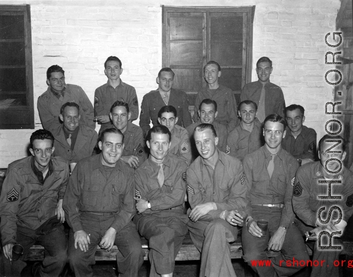 Festive GIs pose in a group in the CBI during WWII. Kenneth Williams is second from right in front row. 