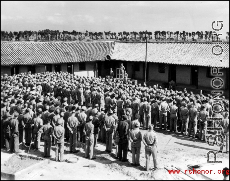 American servicemen listening to a speech in Yunnan province, probably near the 14th Air Force HQ outside of Kunming. 