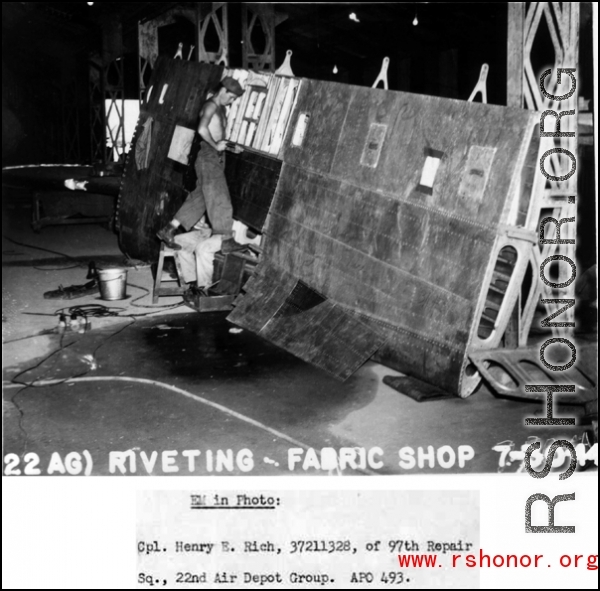 Repairing an aluminum wing, 97th Repair Squadron, fabric shop on July 30, 1944.