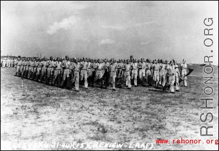 Members of the 61st Air Service Group marching in review on June 21, 1944, at LAAF (Laguna Army Airfield).