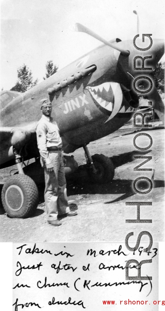 Kenneth Williams in Kunming with a fanged P-40 named 'Jinx'.