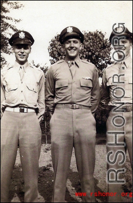 Walter G. Daniels and two of his fellow officers pose in uniform with smiles all around. During WWII.