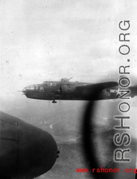 A B-25 of the Ringer Squadron flying in the CBI.