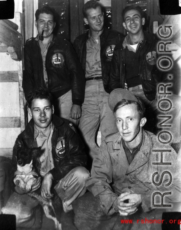 American servicemen in the CBI, posing together (with their dog) in their barracks at an base, possibly Yangkai.  Back (left to right):  John Johnson, Francis E. Strotman, Joseph Siana; Front: Jacob L. Rosencrantz, unknown.