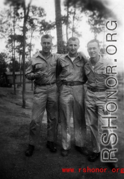 "Dick", Robert Fox, Francis E. Strotman pose in the pine at Yangkai air base, during WWII.