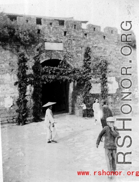 A gate in a city wall in China during WWII.
