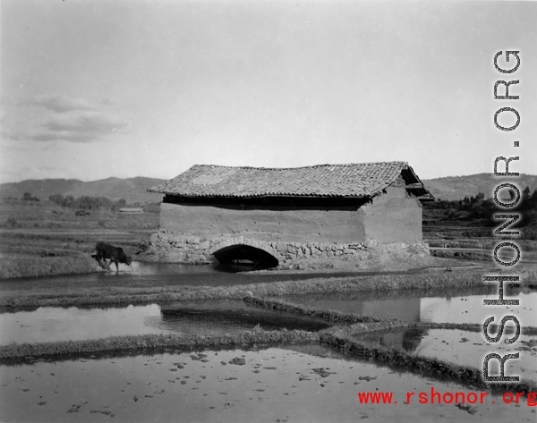 A mill house or similar in the countryside in Yunnan province, China, during WWII.  From the collection of Eugene T. Wozniak.