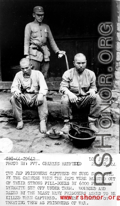 During WWII, two Japanese prisoners captured on Sung Shan Hill by the Chinese. 
