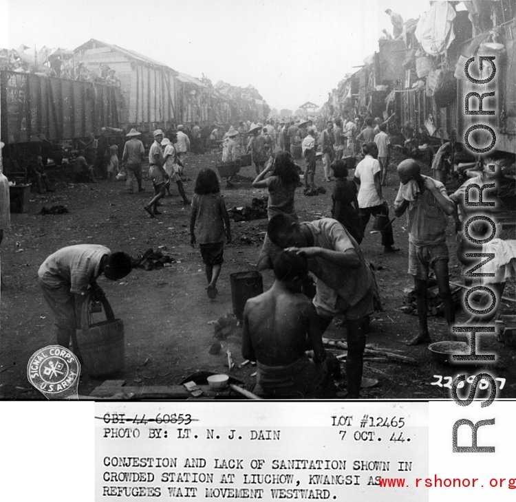 October 7, 1944  Congestion and lack of sanitation shown in crowded station at Liuchow (Liuzhou), Kwangsi (Guangxi) as refugees wait movement westward during WWII.   Photo: Lt. N. J. Dain, Liuzhou, China.