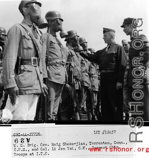 U. S. Brig. Gen. Haig Shekerjian, Torrenten, Conn., C.W.S., and Col. Li Jen Tsi, C.W., Inspect Chinese troops at I.T.C. during WWII.