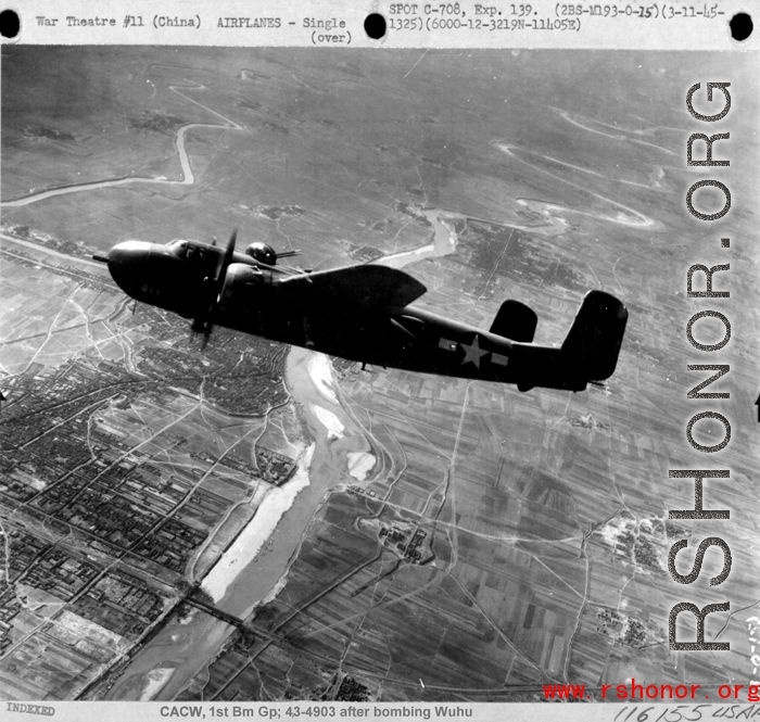 Chinese American Composite Wing (CACW)--1st Bomb Group B-25 #43-4903 after bombing Wuhu.
