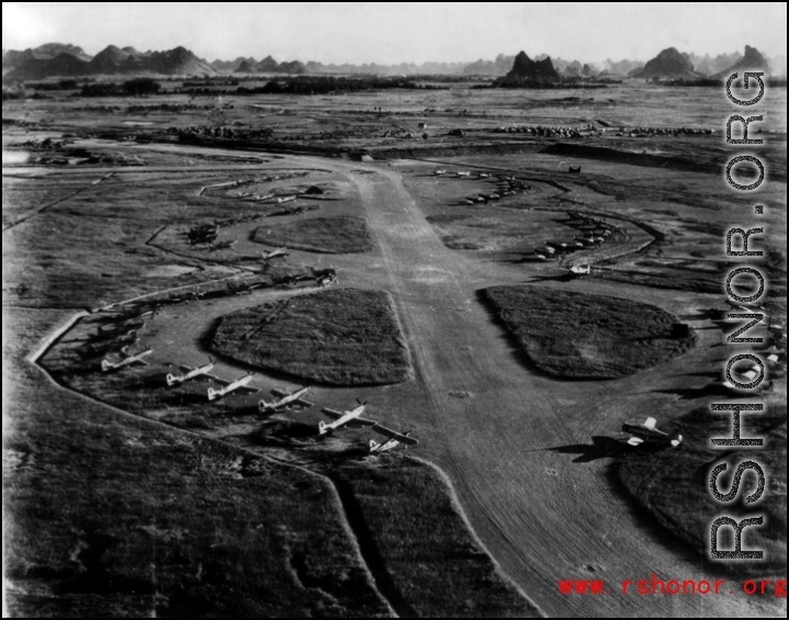 P-51s, L-6s, and other planes at the Liuzhou (Liuchow) air base during the summer or fall of 1945.  The distinct karst mountains of the area are visible in the background.  Photos taken by Robert F. Riese in or around Liuzhou city, Guangxi province, China, in 1945.