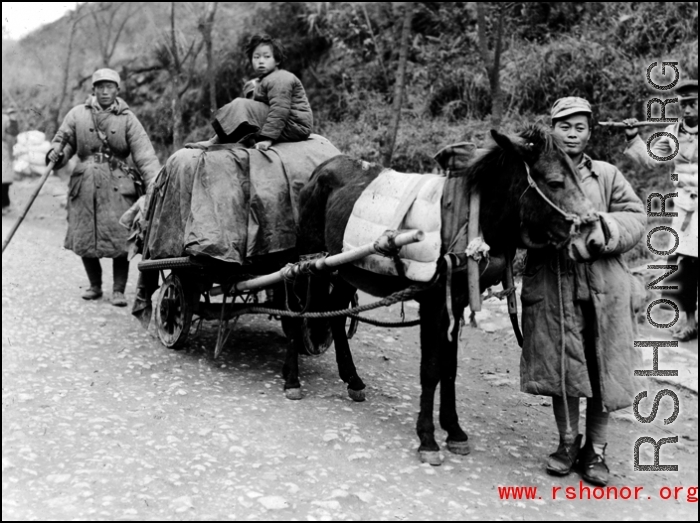 Refugees fleeing during the evacuation before the Japanese Ichigo advance in 1944, in Guangxi province.