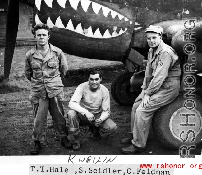 T.T. Hale, S. Seidler, G. Feldman at Guilin (Kwelin) base, in Guangxi province, China, during the Second World War in front of a P-40.  Selig Seidler was a member of the 16th Combat Camera Unit in the CBI during WWII.