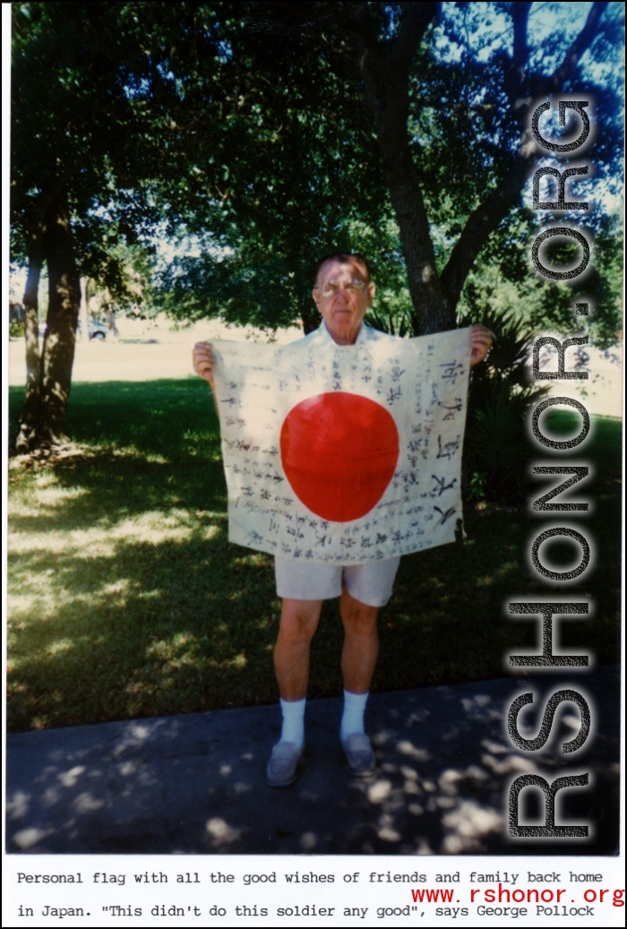 George Pollock shows off trophy captured Japanese Good-Luck Flag  (寄せ書き日の丸) collected on the battleground in the CBI during WWII.