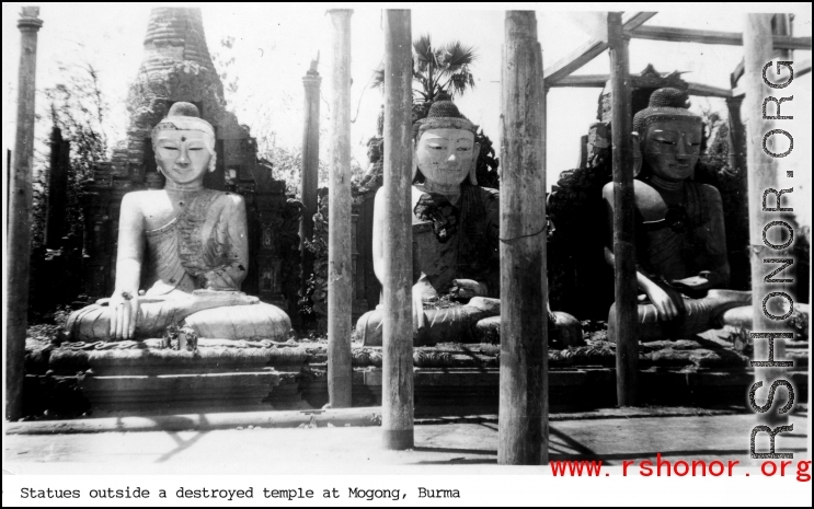 Buddhist statues at Mogong, Burma, outside destroyed temple. During WWII.