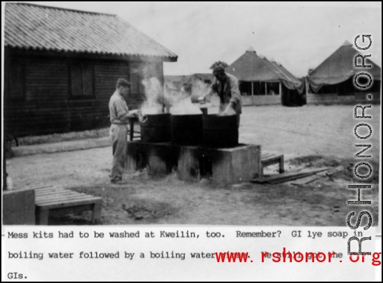 GIs washing mess kits at camp in Guilin, during WWII.