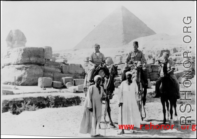 GIs ride camels in Cairo while on their way back to US from China after the end of the war.