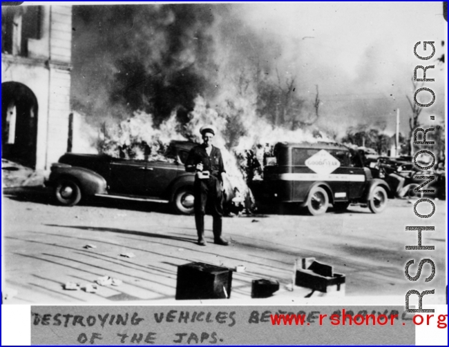 Destroying vehicles before Japanese invasion, possibly in Rangoon, Burma. During WWII.