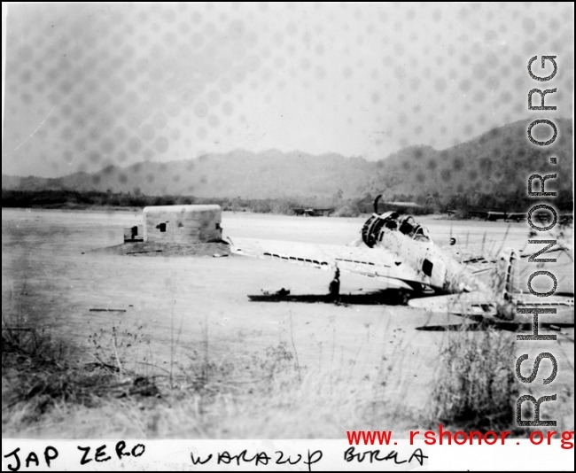 Ruined Japanese Zero at Warazup, Burma, during WWII.
