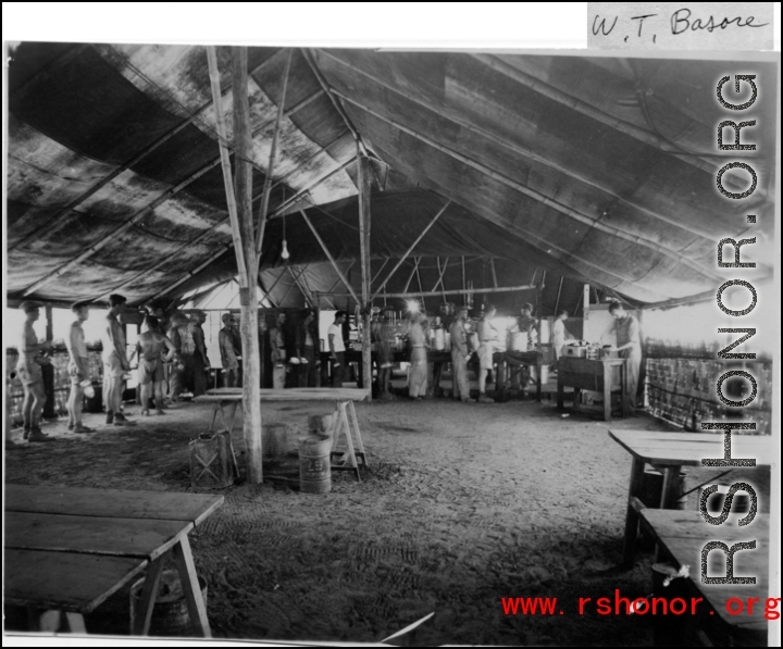 GIs waiting in mess line for grub in the CBI during WWII. Photo from W. T. Basore.