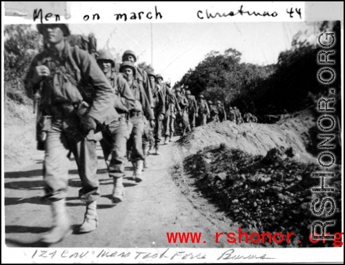 Soldiers of the Mars Task Force (124th Calvary Regiment ) marching in Burma on Christmas Day during WWII.