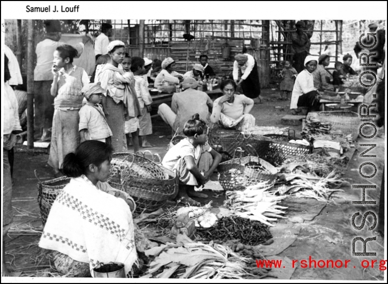 A farmer's market in SW China or Burma during WWII.  Photo from Samuel J. Louff.