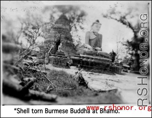 Shell torn Burmese Buddha at Bhamo, Burma, during WWII.