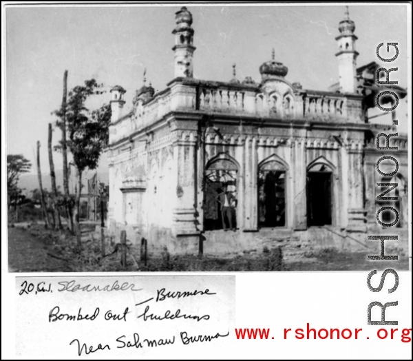 Bombed out Burmese buildings near Sahmaw, Burma, during WWII.  Photo from C. J. Sloanaker.