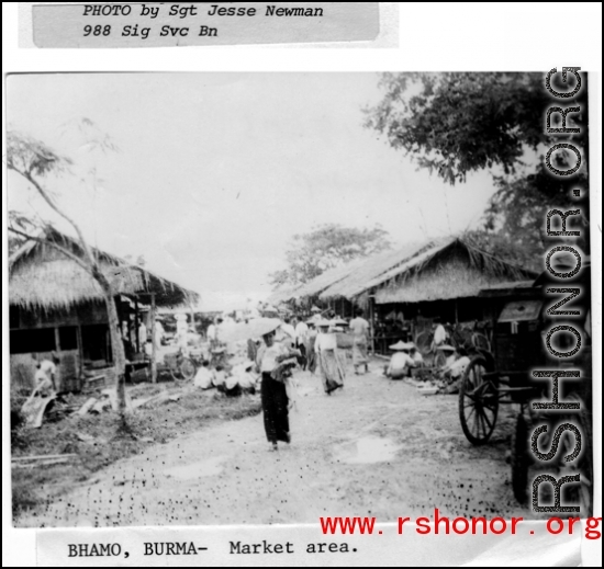 Market area in Bhamo, Burma. Photo by Sgt. Jesse D. Newman, 988th Signal Service Battalion.  In the CBI during WWII.
