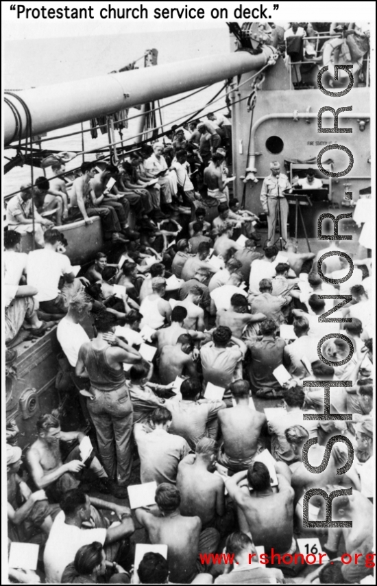 GIs gathered for a Protestant church service on deck of a ship (the Marine Raven) on the return voyage back to the US after the war.  In the CBI during WWII.