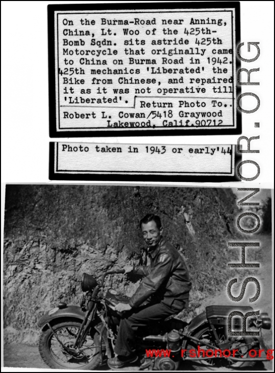 Lt. Woo of the 425th Bomb Squadron sits aside a 425th Bomb Squadron motorcycle that originally came to China on the Burma Road in 1942. 425th Bomb Squadron mechanic made repaired the motorcycle and made it operational after it was "Liberated" from the Chinese.  In the CBI during WWII, during 1943 or early 1944.  Photo from Robert L. Cowan.