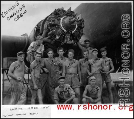 Engine change crew work on a C-47 transport plane in the CBI. 330th Troop Carrier, 9th CC. 1945.