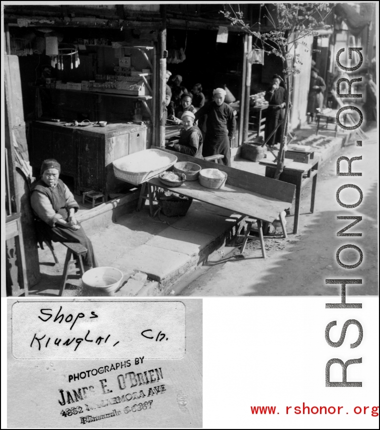 Shops in Kiunglai, China, during WWII.  Photo from James E. O'Brien.