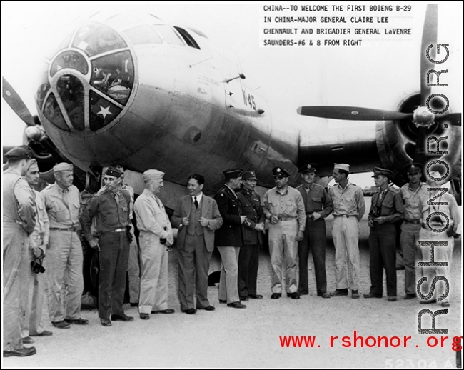 VIPs welcome first B-29 bomber, "K-45" to arrive in China during WWII--Major General Claire Chennault and Brigadier General LaVerne Saunders #6 & 8 from right.