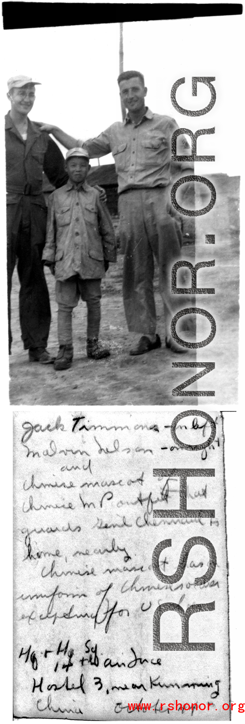 Timmons and Nelson with Chinese kid in soldier's uniform, Hostel #3 near Kunming, October 1945.